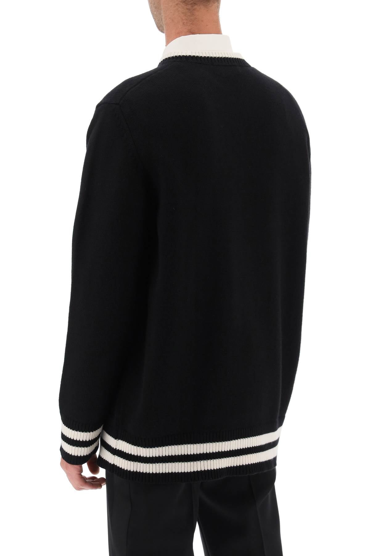 Alexander mcqueen varsity sweater with skull motif