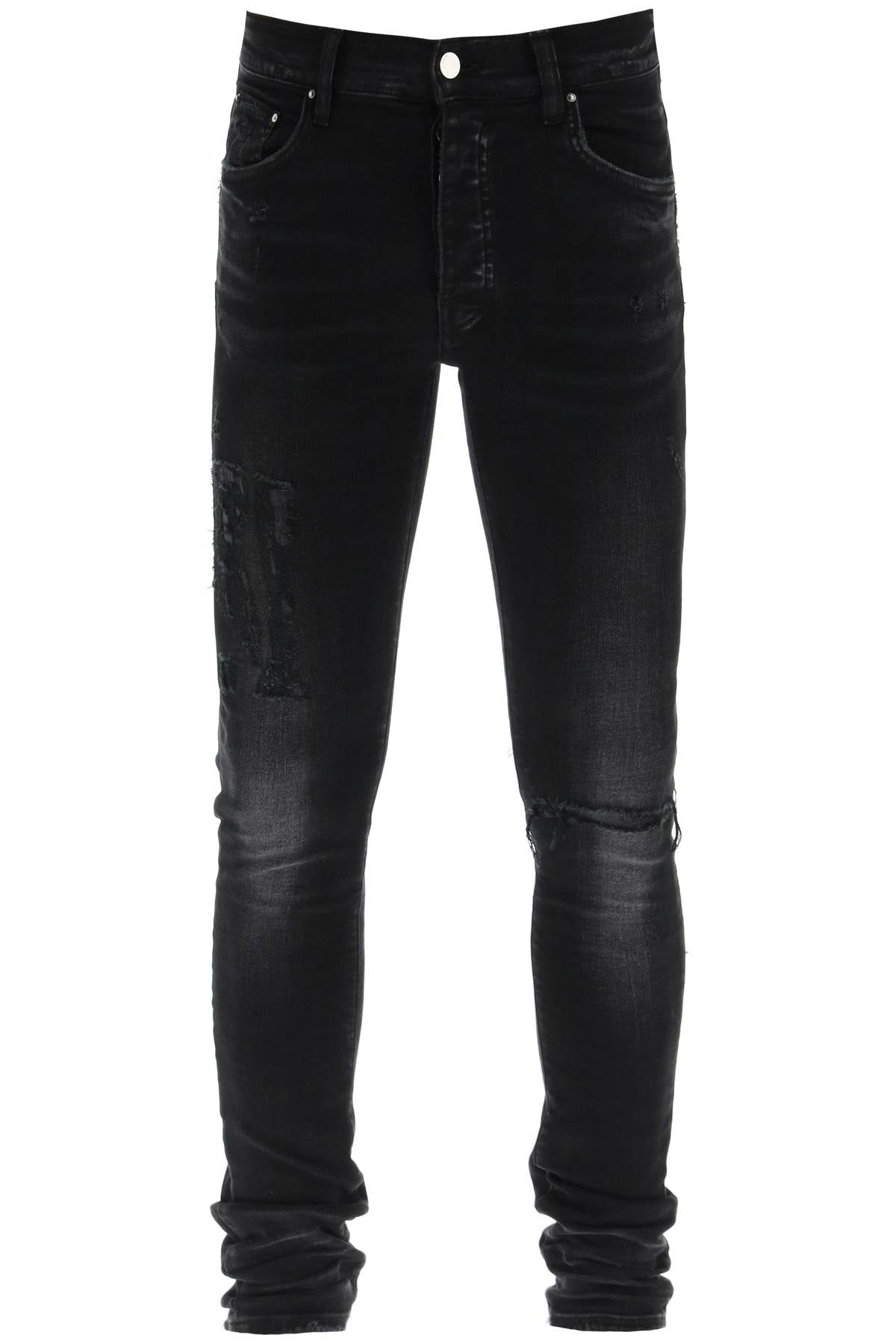 Amiri 'distressed logo' jeans